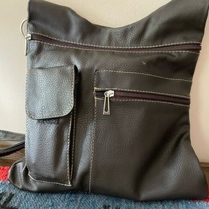 Brown leather crossbody bag.